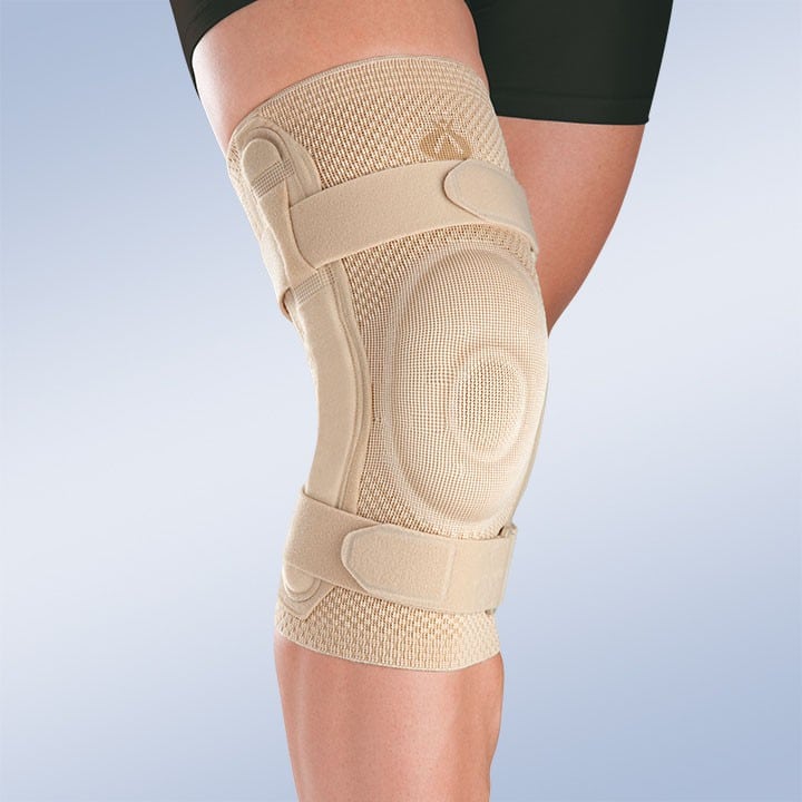 CLOSED PATELLA KNEE BRACE W/ SILICONE PAD AND POLYCENTRIC REINFORCEMENTS