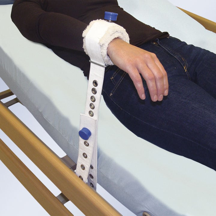 HARNESS WRIST TO BED WITH MAGNETS
