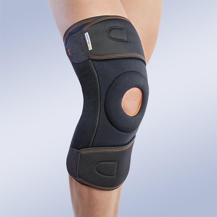 WRAP AROUND KNEE SUPPORT WITH POLYCENTRIC JOINTS